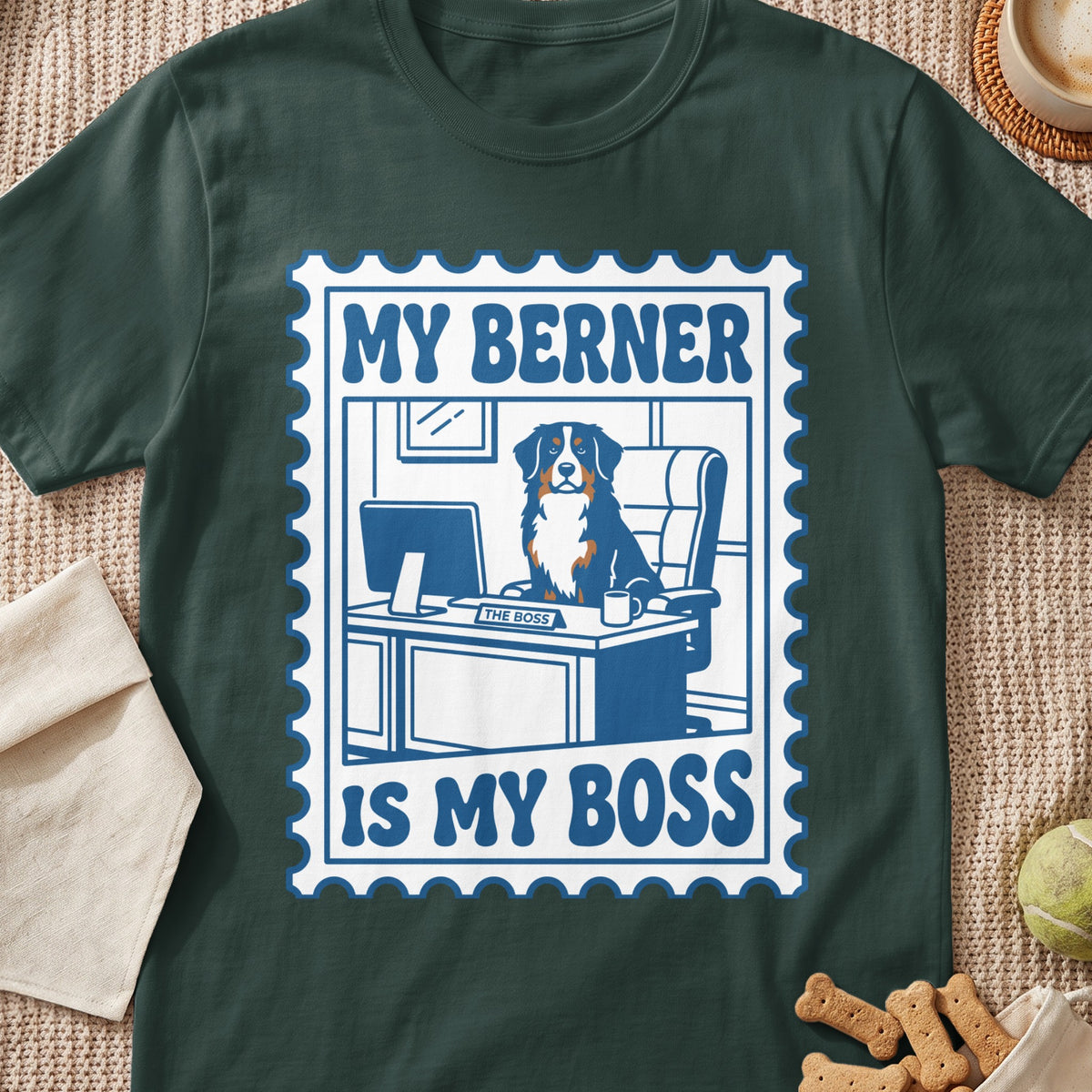 Bernese Mountain Dog sitting at desk with "The Boss" nameplate. Text reads "MY BERNER IS MY BOSS".