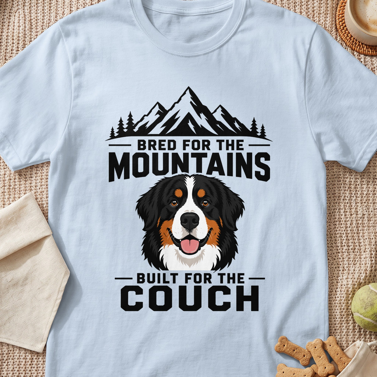 Light blue t-shirt with a Bernese Mountain Dog graphic and text "Bred for the Mountains, Built for the Couch."