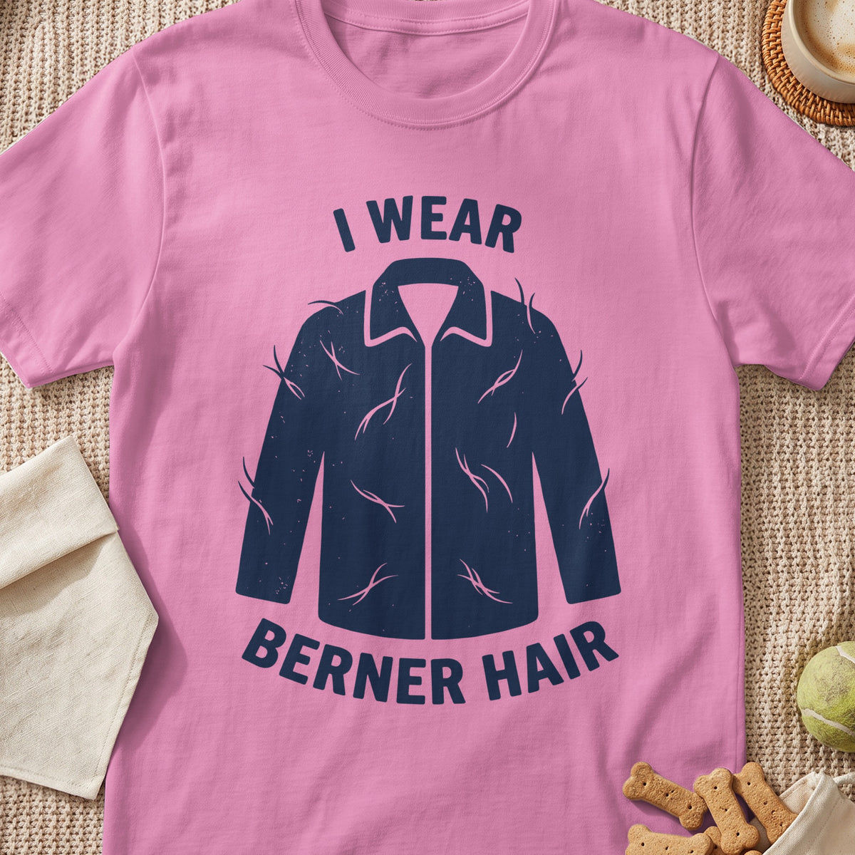 Pink t-shirt with "I WEAR BERNER HAIR" text and a dark blue outline of a coat.
