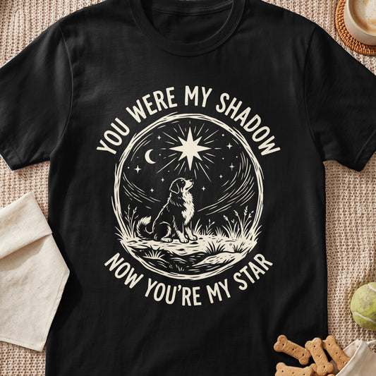 Black t-shirt with a dog looking at a star, reading "You were my shadow, now you're my star."