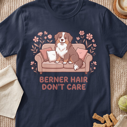 Dog on couch with flowers and text "BERNER HAIR DON'T CARE"