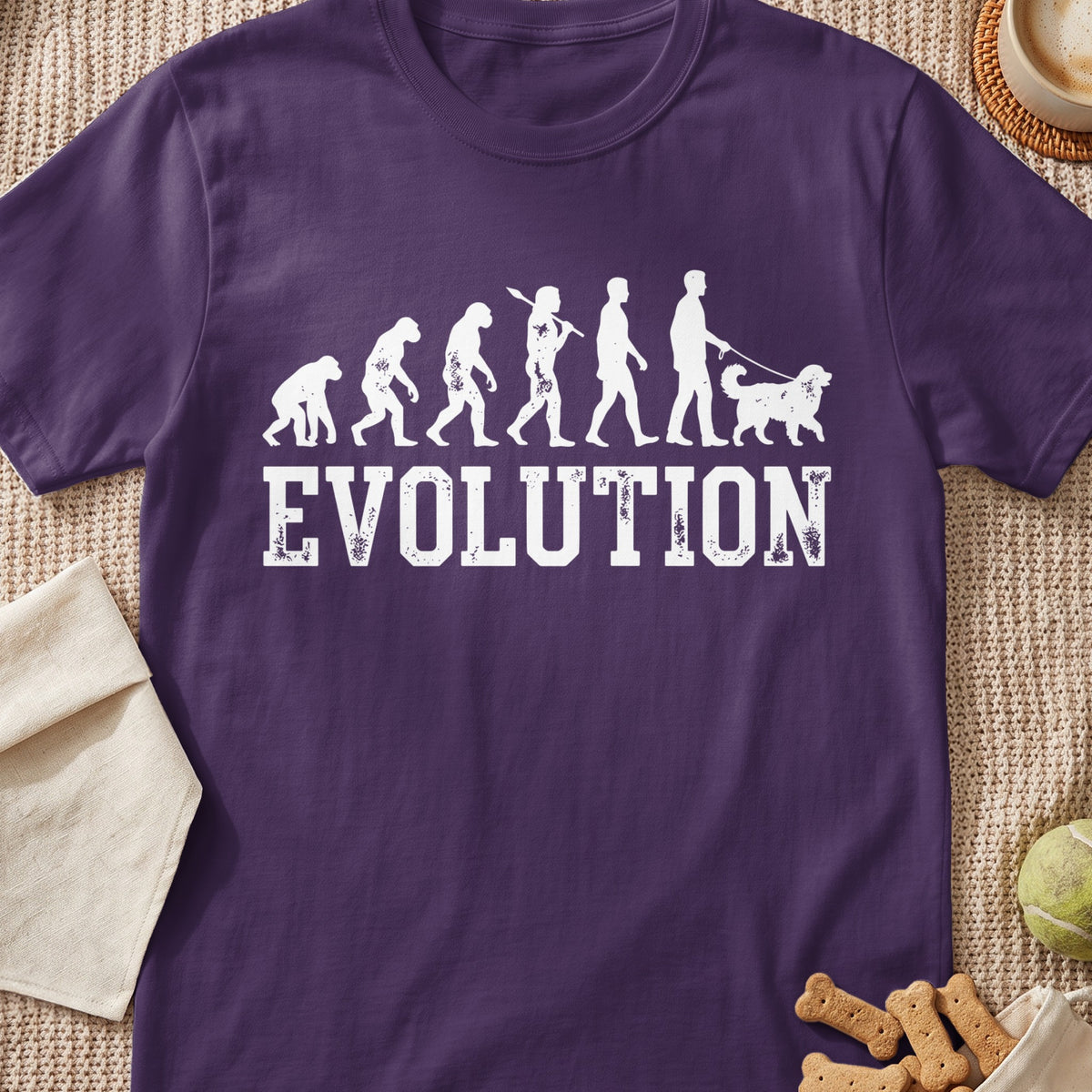 Purple t-shirt with white graphic of human evolution ending with person walking a dog.