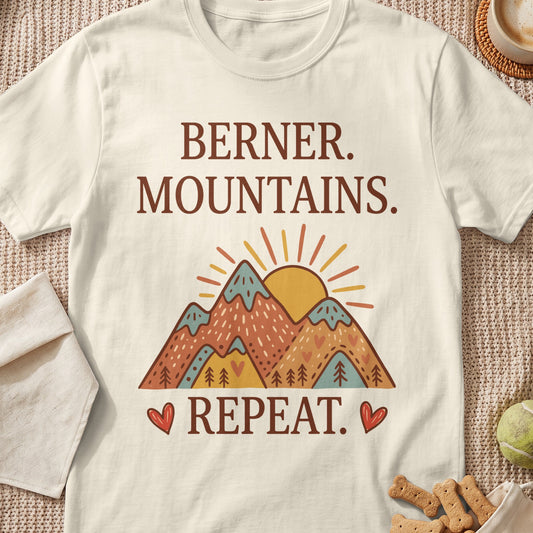 Cream t-shirt with "BERNER. MOUNTAINS. REPEAT." text and mountain illustration.