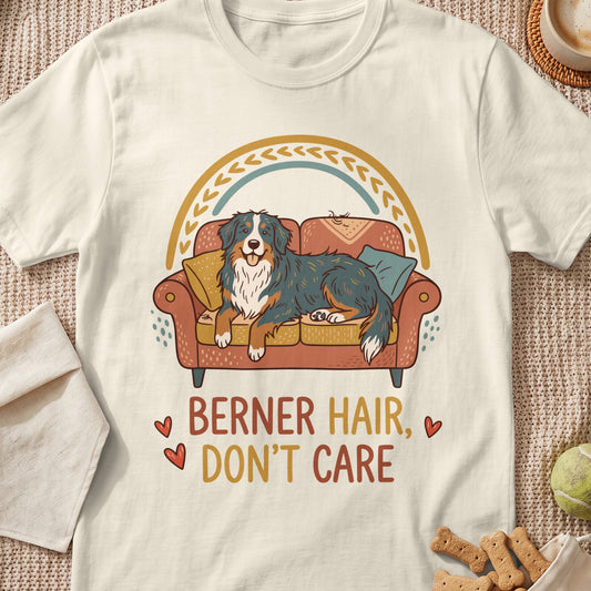 Bernese Mountain Dog on couch with text "Berner Hair, Don't Care".