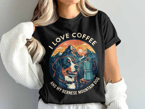 Black t-shirt graphic with Bernese Mountain Dog, coffee pot, mountains and text "I LOVE COFFEE AND MY BERNESE MOUNTAIN DOG".
