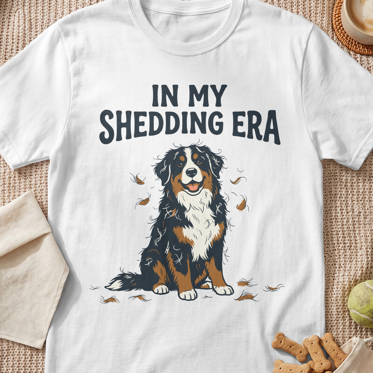 White t-shirt with a Bernese Mountain Dog illustration and "IN MY SHEDDING ERA" text.
