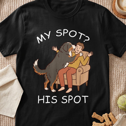 Black t-shirt with illustration of a dog licking a man on the couch and text "MY SPOT? HIS SPOT".