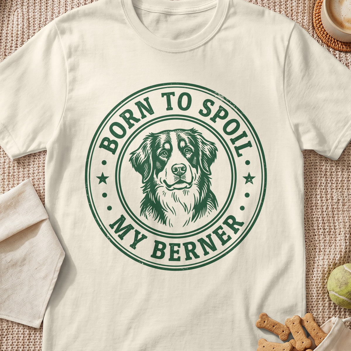 Cream t-shirt with green "Born to Spoil My Berner" text and Bernese Mountain Dog graphic.
