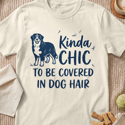 T-shirt with navy blue illustration of a dog and text "Kinda CHIC TO BE COVERED IN DOG HAIR".