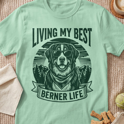 Bernese Mountain Dog wearing sunglasses and bandana, text "LIVING MY BEST BERNER LIFE".