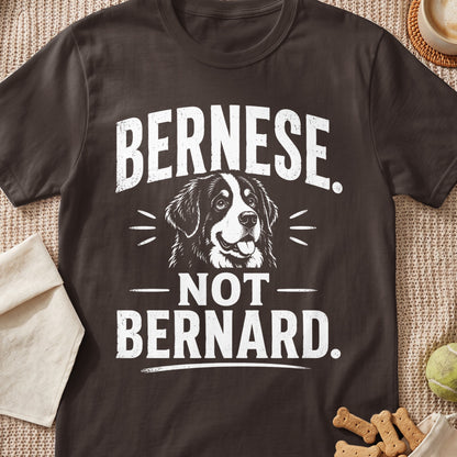 Dark brown t-shirt featuring a white graphic of a Bernese Mountain Dog and the text Bernese Not Bernard.