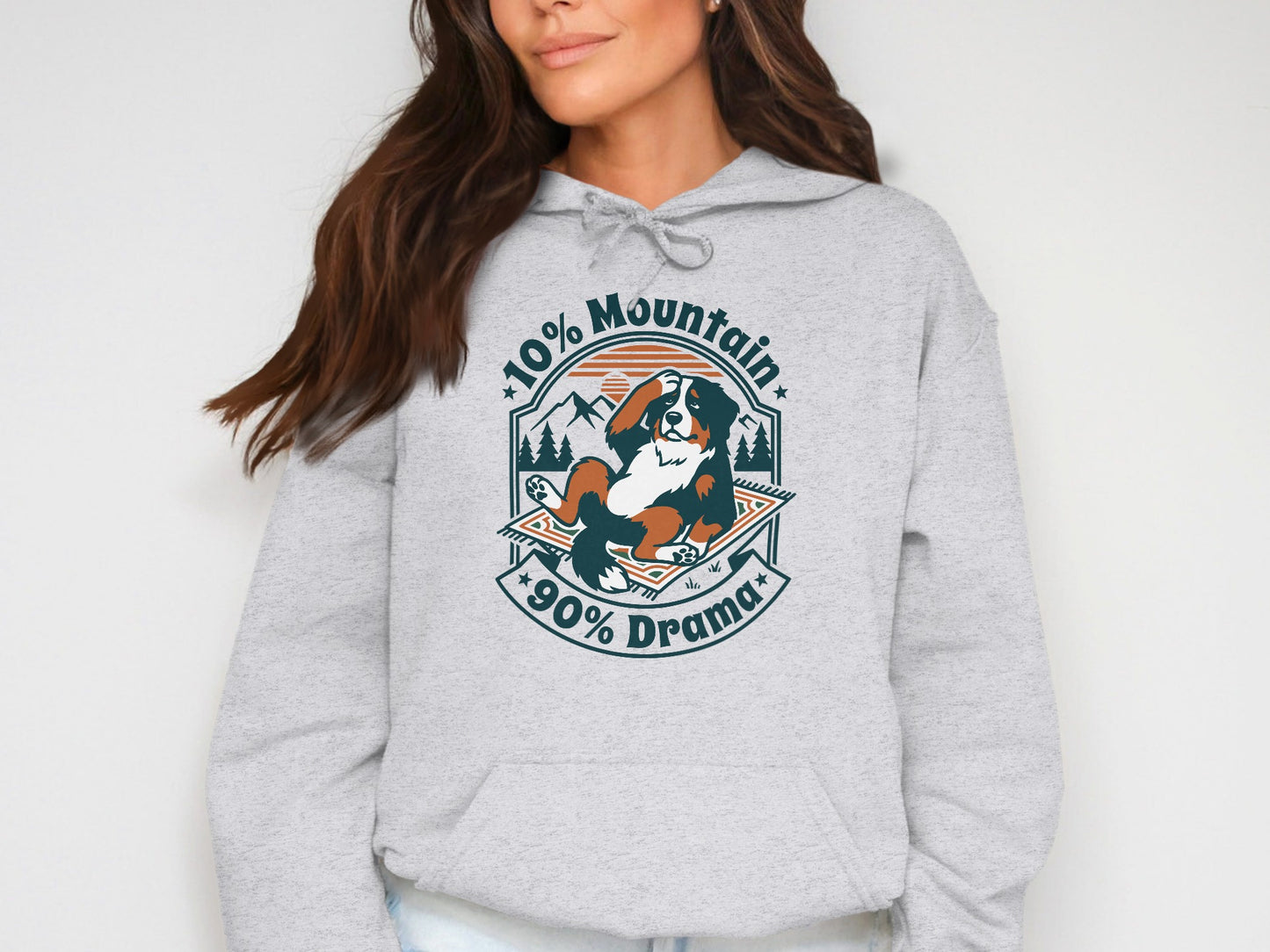 Bernese Mountain Dog on a rug with "10% Mountain 90% Drama" text.