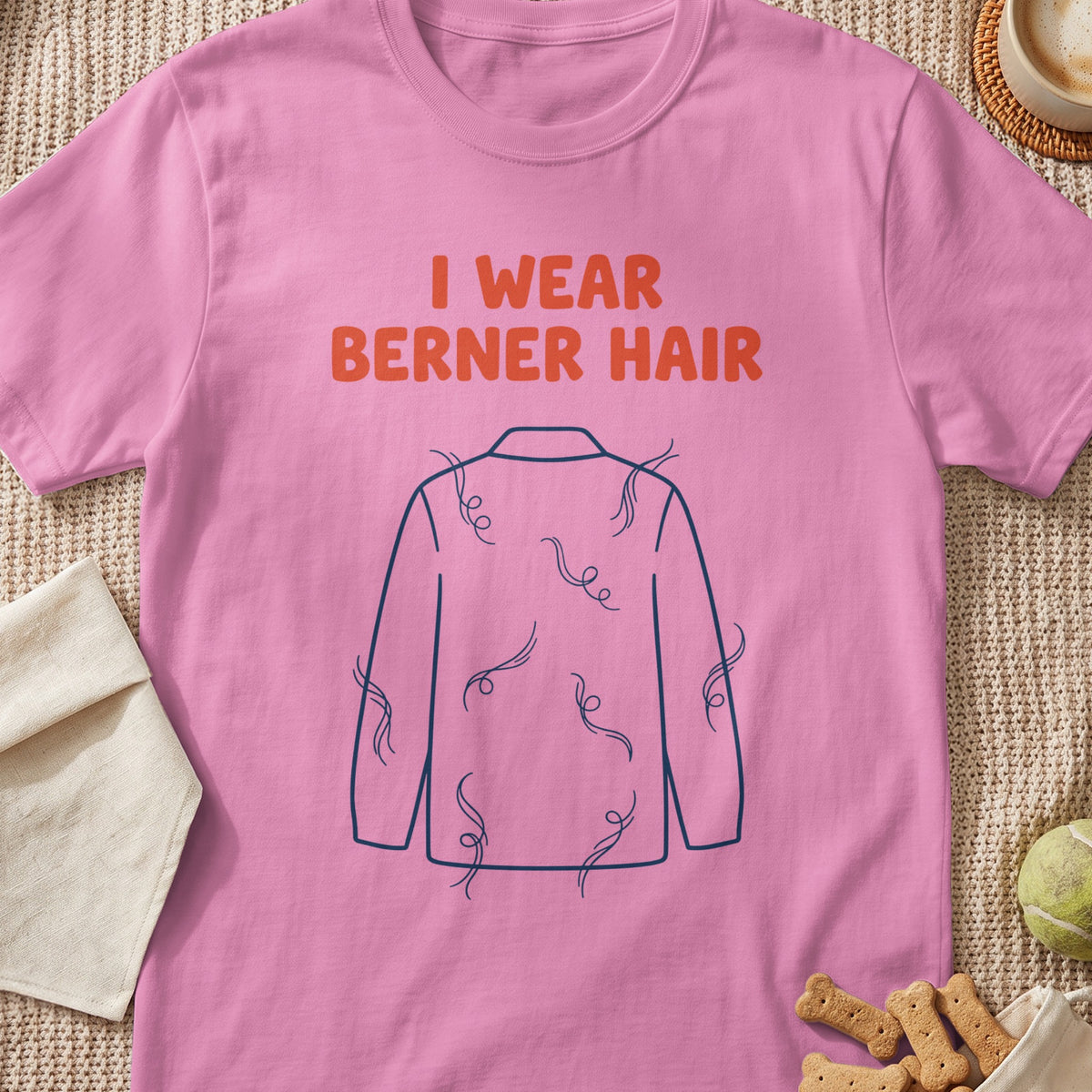 Pink t-shirt with text "I WEAR BERNER HAIR" and a diagram of a shirt covered in fur.