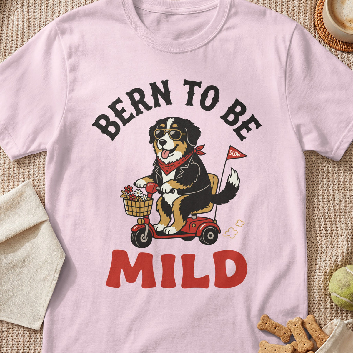 Bern to Be Mild text with Bernese Mountain Dog on a scooter.