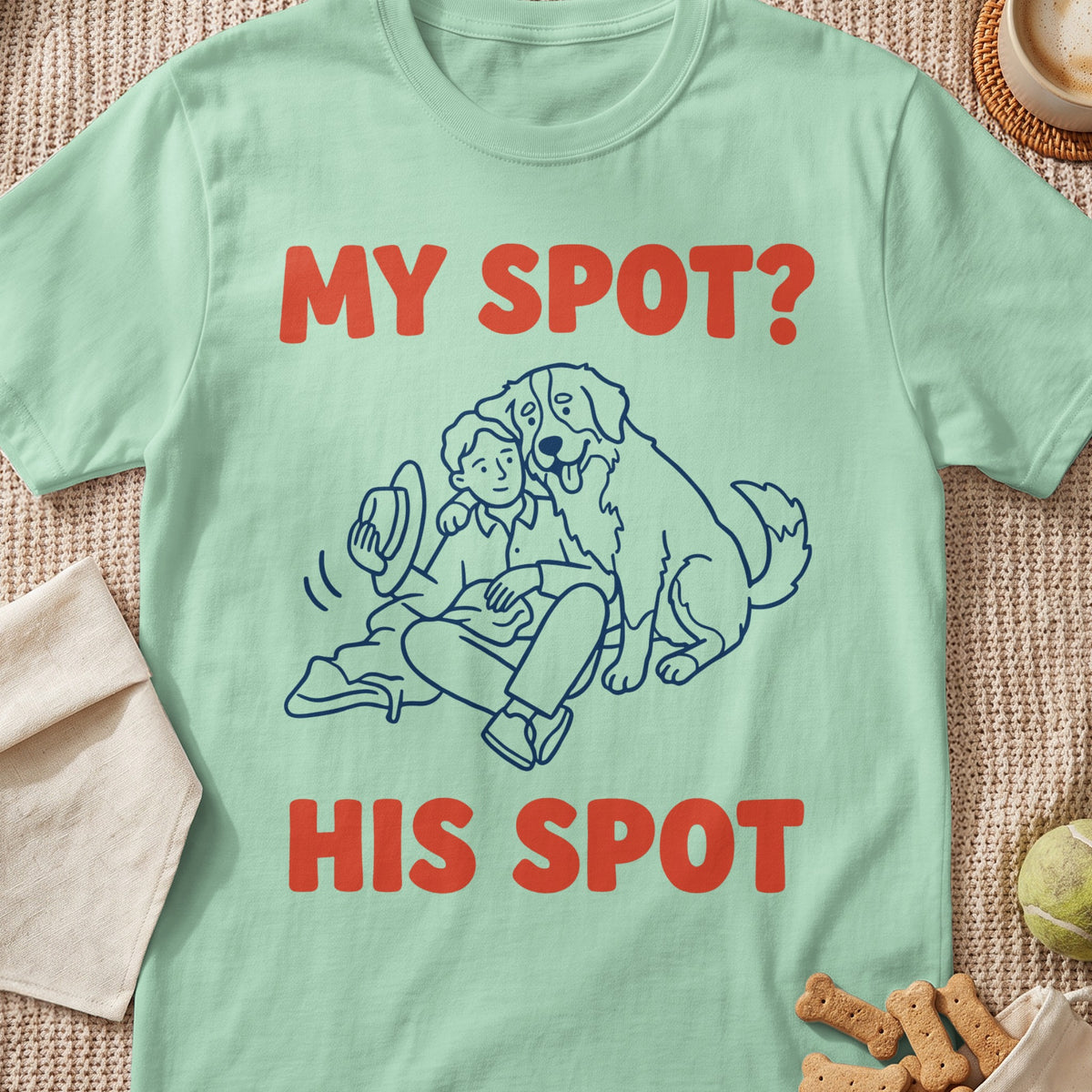 Mint t-shirt with line drawing of person and dog, text "MY SPOT? HIS SPOT."