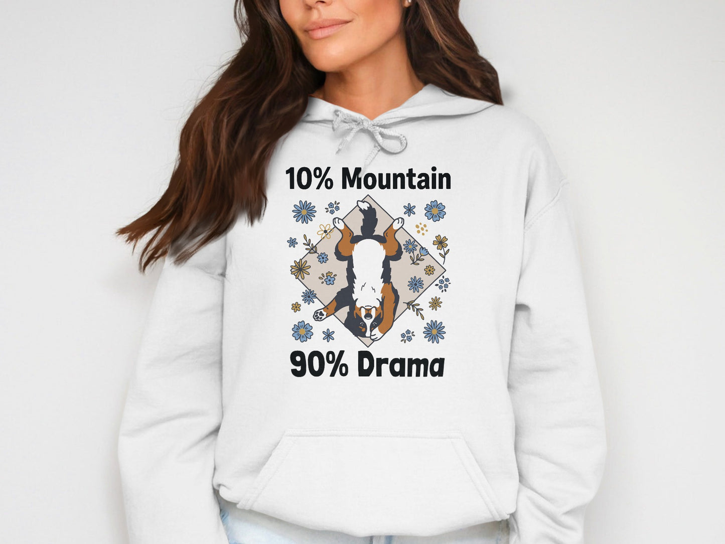 White hoodie with a Bernese Mountain Dog and text "10% Mountain 90% Drama."