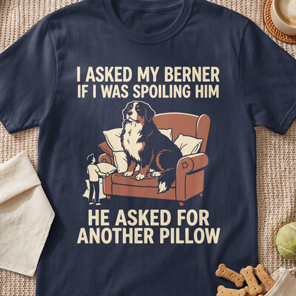 Bernese Mountain Dog on armchair, with text "I asked my Berner if I was spoiling him. He asked for another pillow."
