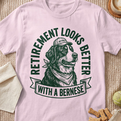 Bernese Mountain Dog wearing a bandana and a "Retired" hat, reads "Retirement Looks Better With A Bernese."