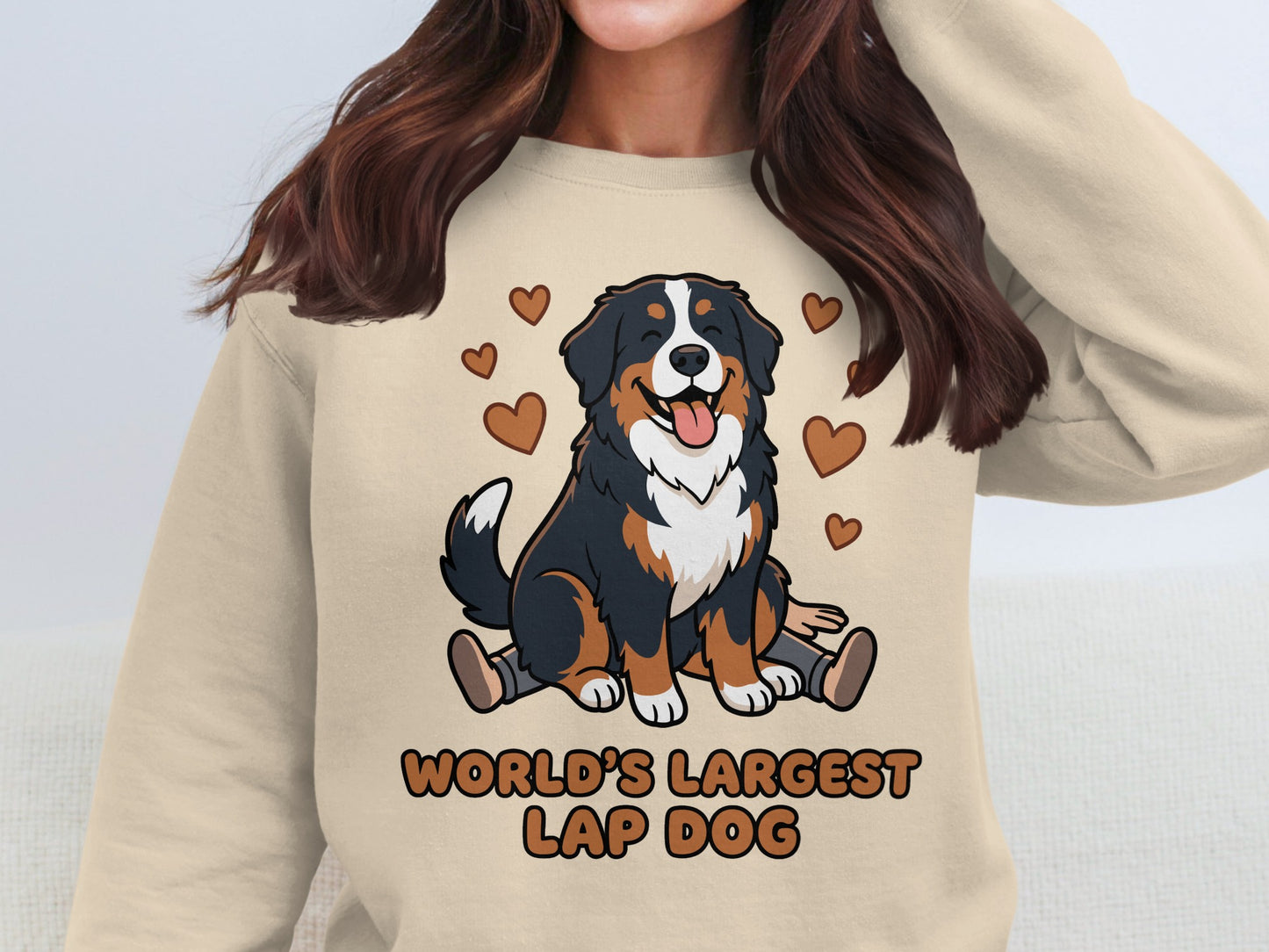 Bernese Mountain Dog graphic with text "WORLD'S LARGEST LAP DOG" on sweatshirt.