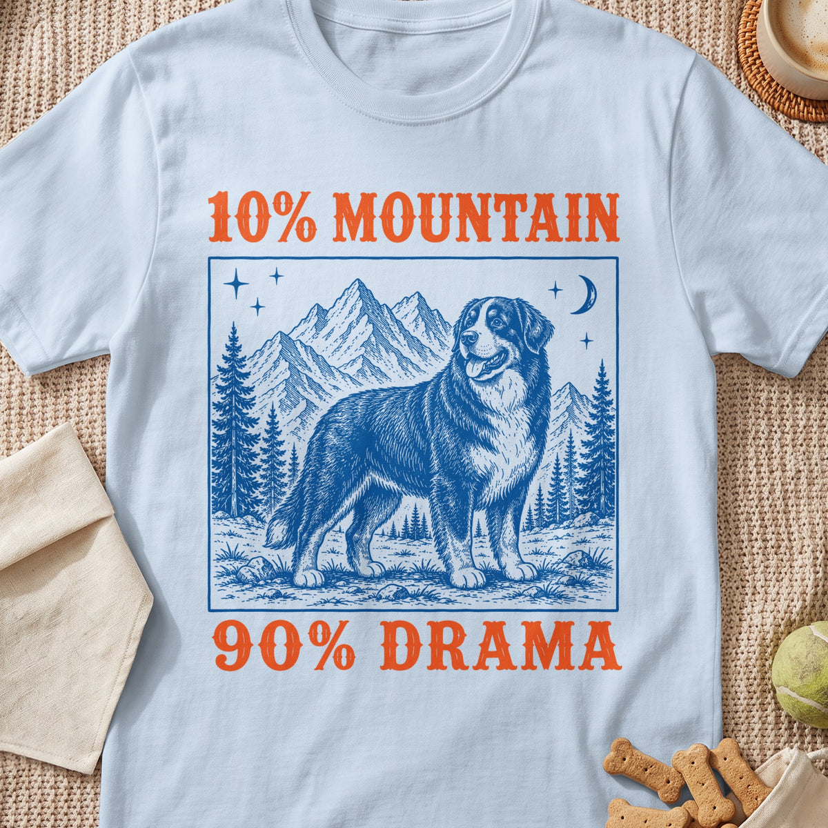 T-shirt graphic: dog in mountains with text "10% Mountain 90% Drama"