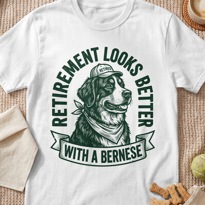 Bernese dog wearing a "Retired" cap and bandana, with text "Retirement looks better with a Bernese".
