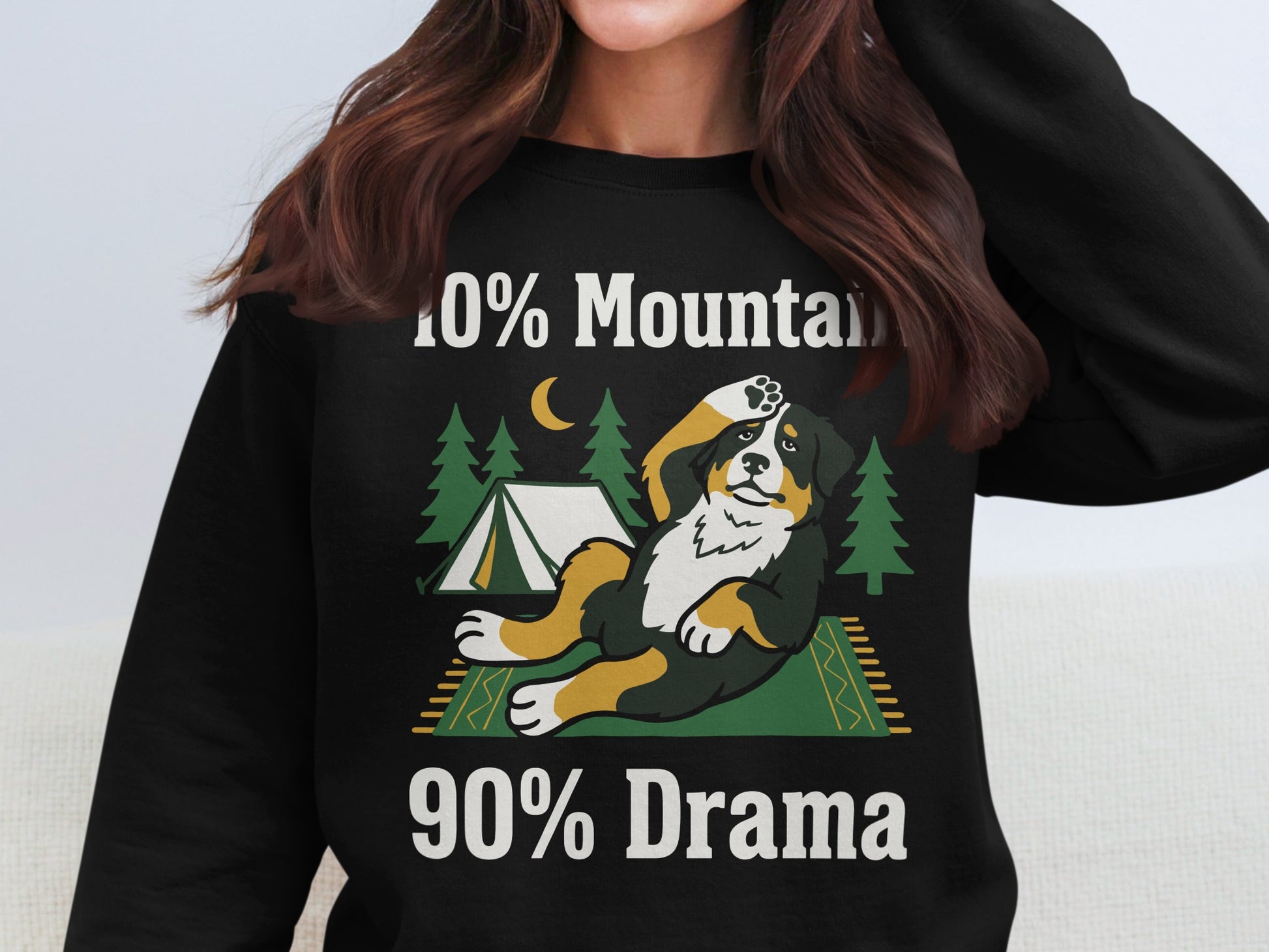 Black sweatshirt with a graphic of a Bernese Mountain Dog and text, "10% Mountain 90% Drama".