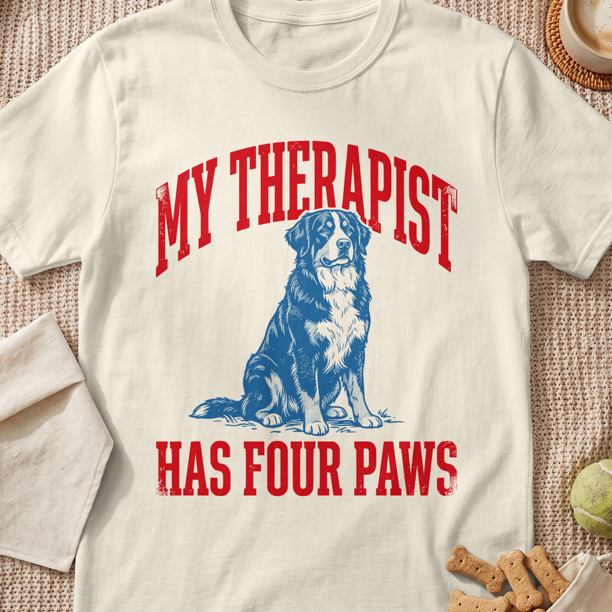 Cream t-shirt with blue Bernese Mountain Dog and red text "MY THERAPIST HAS FOUR PAWS".