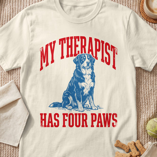 Cream t-shirt with blue Bernese Mountain Dog and red text "MY THERAPIST HAS FOUR PAWS".
