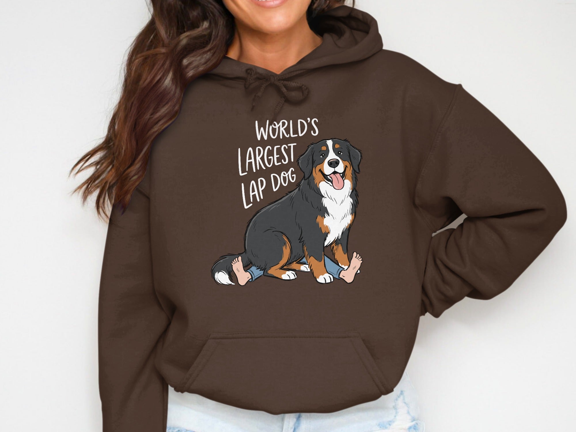Brown hoodie with a Bernese Mountain Dog illustration and text "World's Largest Lap Dog."