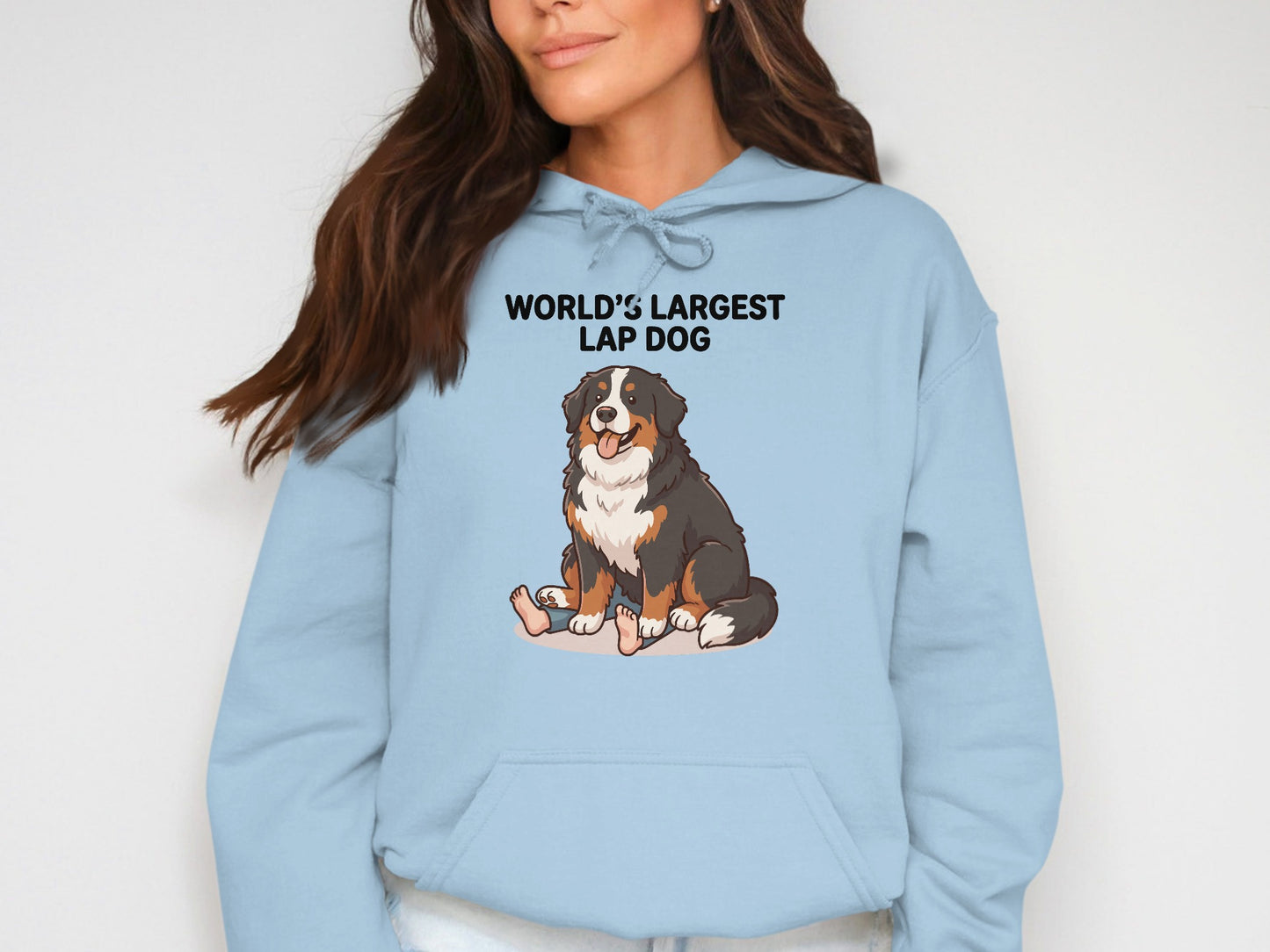 Light blue hoodie with "World's Largest Lap Dog" and cartoon Bernese Mountain Dog.
