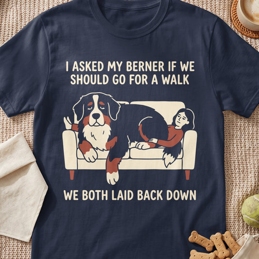 Dark blue t-shirt with graphic of a Bernese Mountain Dog and person lounging on a couch.