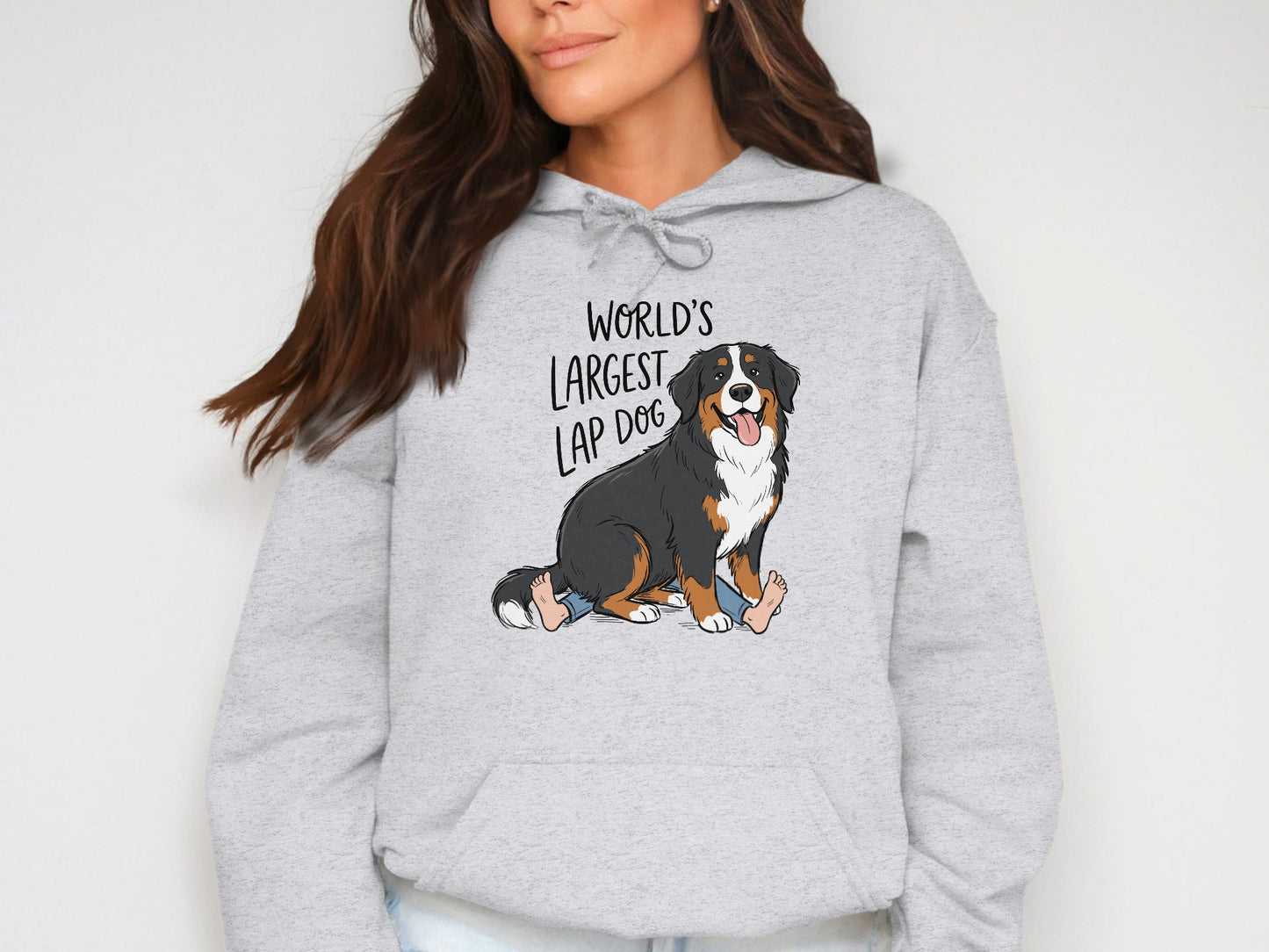 Bernese Mountain Dog graphic with text "WORLD'S LARGEST LAP DOG" on a grey hoodie.