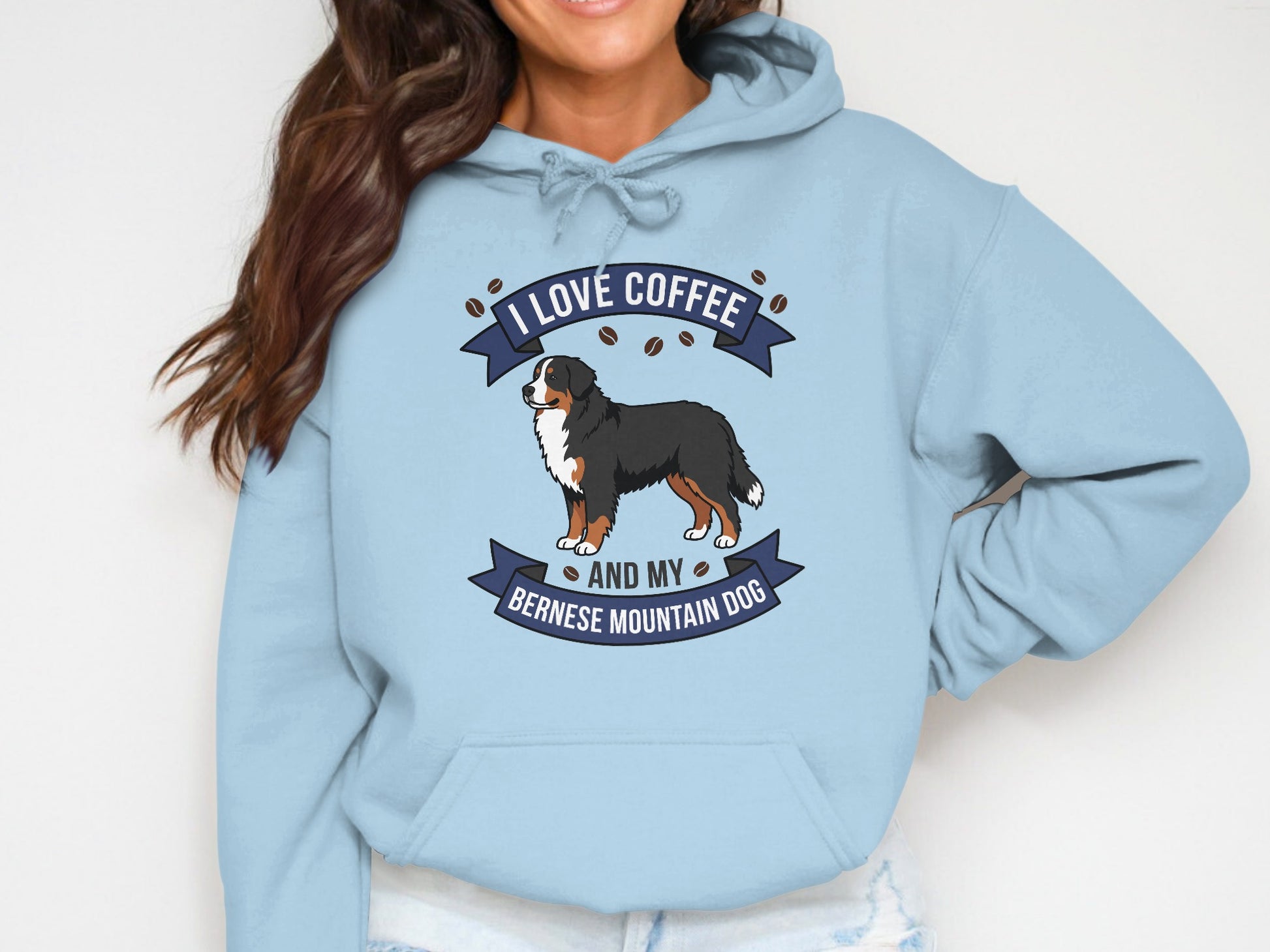 Light blue hoodie graphic with Bernese Mountain Dog and text "I LOVE COFFEE AND MY BERNESE MOUNTAIN DOG".