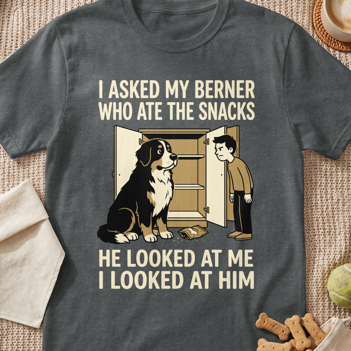 Bernese dog sits by open cabinet with spilled snacks and a boy looking at him.