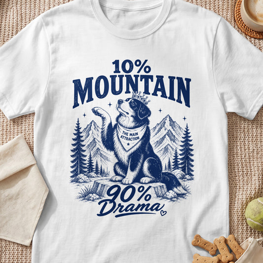 Dog wearing crown and bandana with text "The Main Attraction", 10% Mountain 90% Drama.