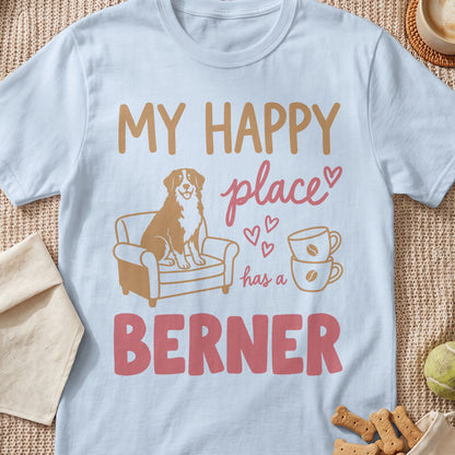 Light blue t-shirt with text: My happy place has a Berner, a dog on a chair, and coffee cups.