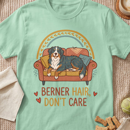 Berner dog on a couch with text "BERNER HAIR, DON'T CARE".