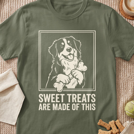 Dog holding a bone with text "SWEET TREATS ARE MADE OF THIS."