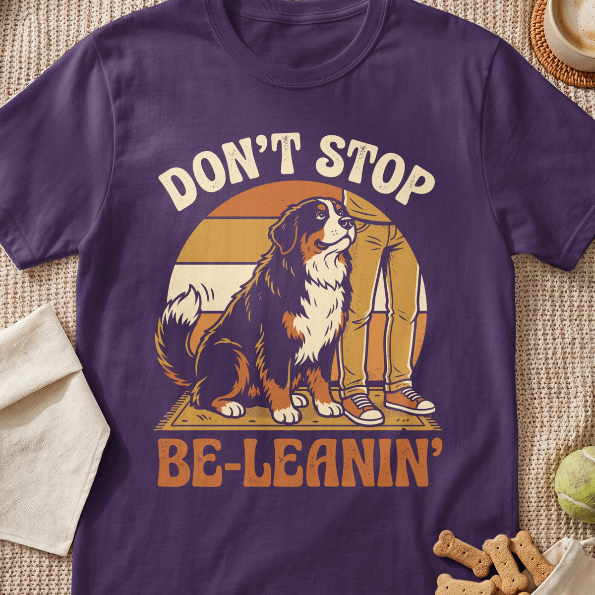Bernese mountain dog and person graphic with text "DON'T STOP BE-LEANIN'"