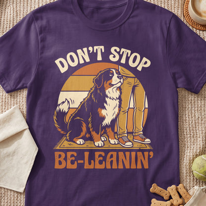 Bernese mountain dog and person graphic with text "DON'T STOP BE-LEANIN'"