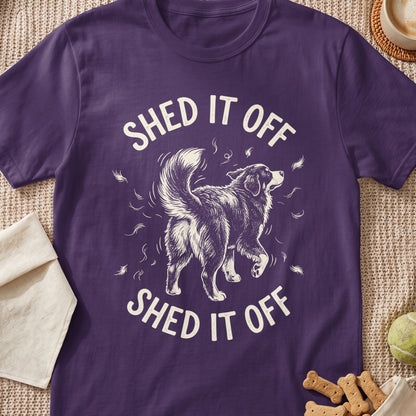 Purple t-shirt with a drawing of a dog and "SHED IT OFF" text.
