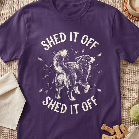Purple t-shirt with a drawing of a dog and "SHED IT OFF" text.