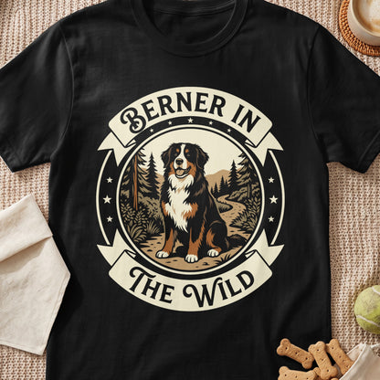 Bernese mountain dog in woodland scene with text "Berner in the Wild."