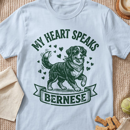 Light blue t-shirt with green "My Heart Speaks Bernese" text and a dog graphic.