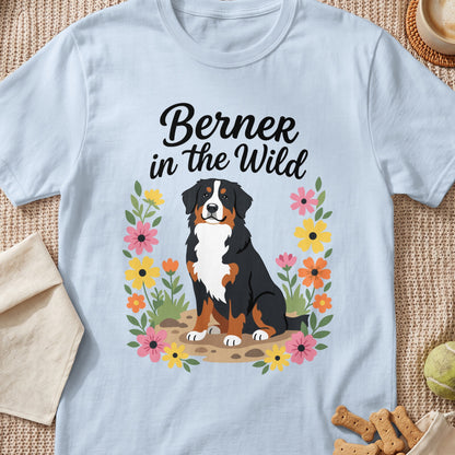 Bernese Mountain Dog with "Berner in the Wild" text surrounded by colorful flowers.