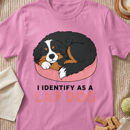 Bernese Mountain Dog sleeping on a pink pillow with text "I IDENTIFY AS A LAP DOG".