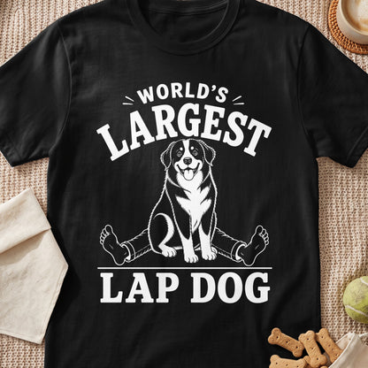 Black t-shirt with white text and illustration reading "World's Largest Lap Dog" featuring a dog.