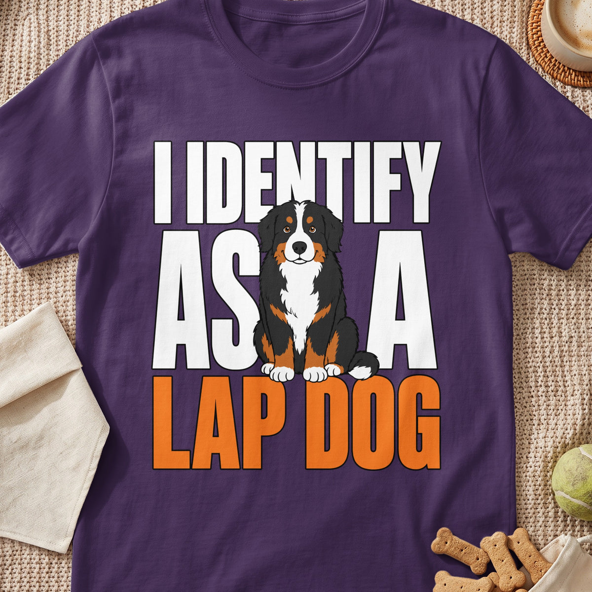 Purple t-shirt with text "I IDENTIFY AS A LAP DOG" and a Bernese Mountain Dog.