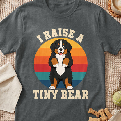 Bernese Mountain Dog graphic on t-shirt with text "I RAISE A TINY BEAR"