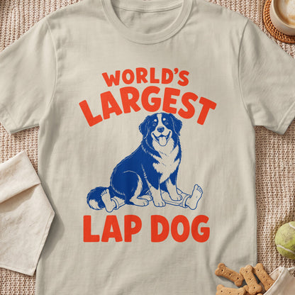 Cream t-shirt with "World's Largest Lap Dog" text and blue dog illustration.